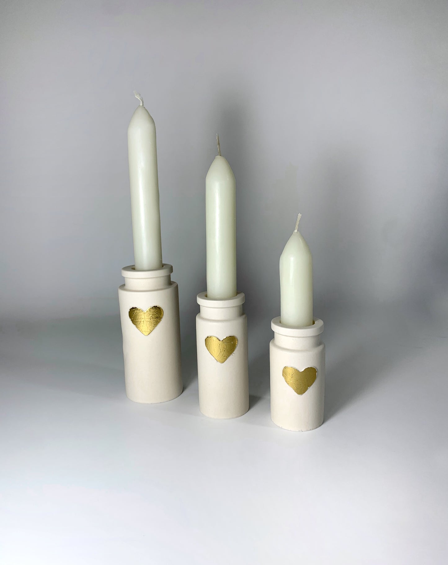 Lot de trois bougeoirs