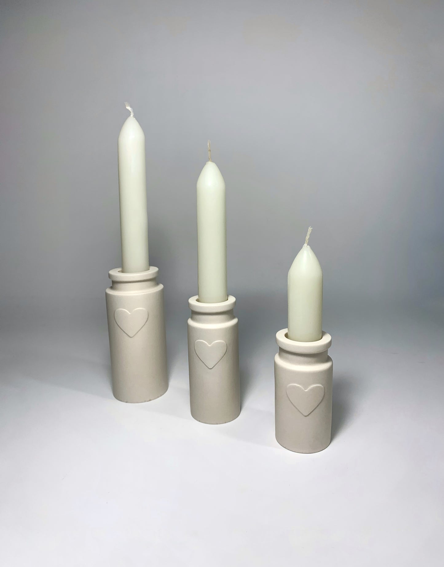 Lot de trois bougeoirs