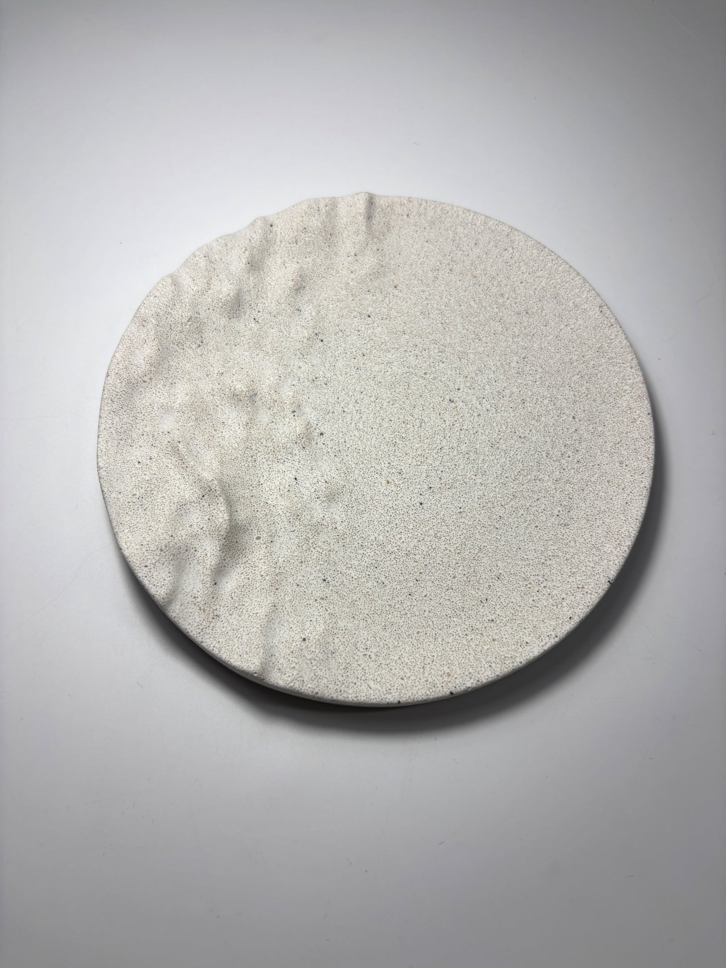Plateau rond texturé -32%
