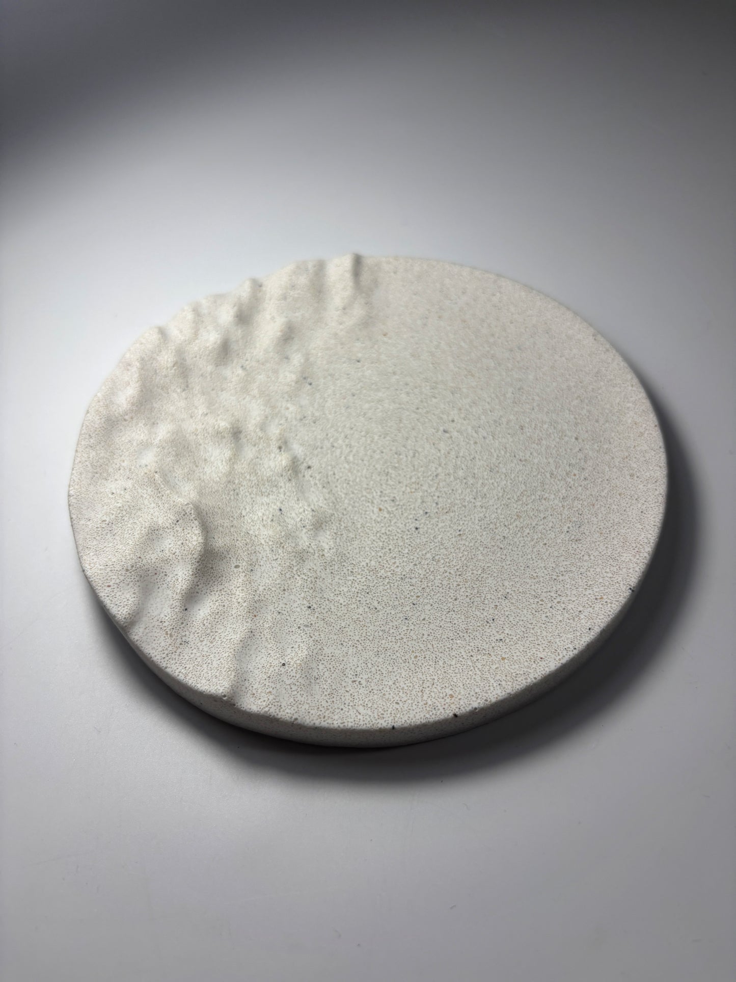 Plateau rond texturé -32%